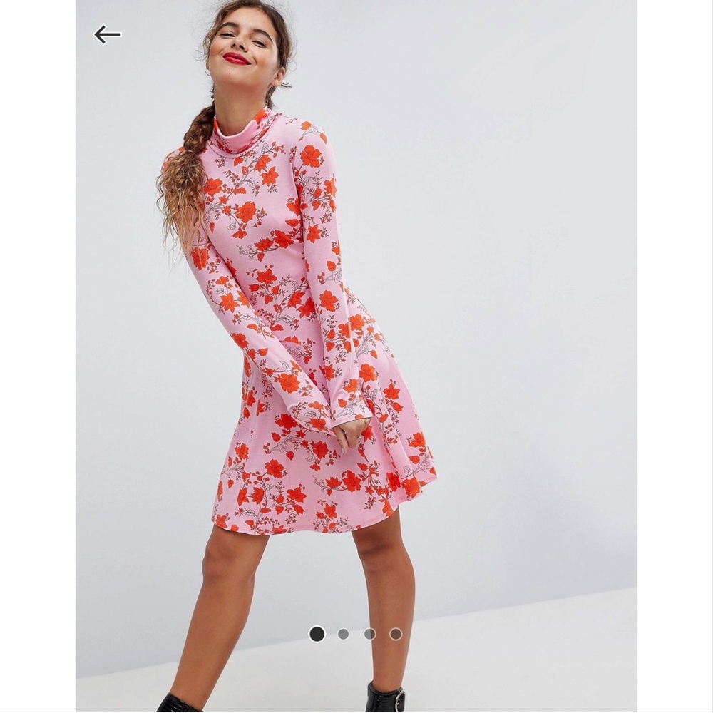Turtle neck printed flare dress.